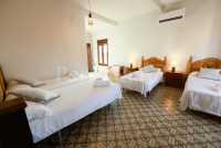 Dormitorio con 4 camas